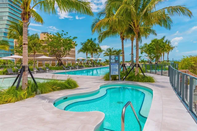 a view of a bathroom with a shower curtain