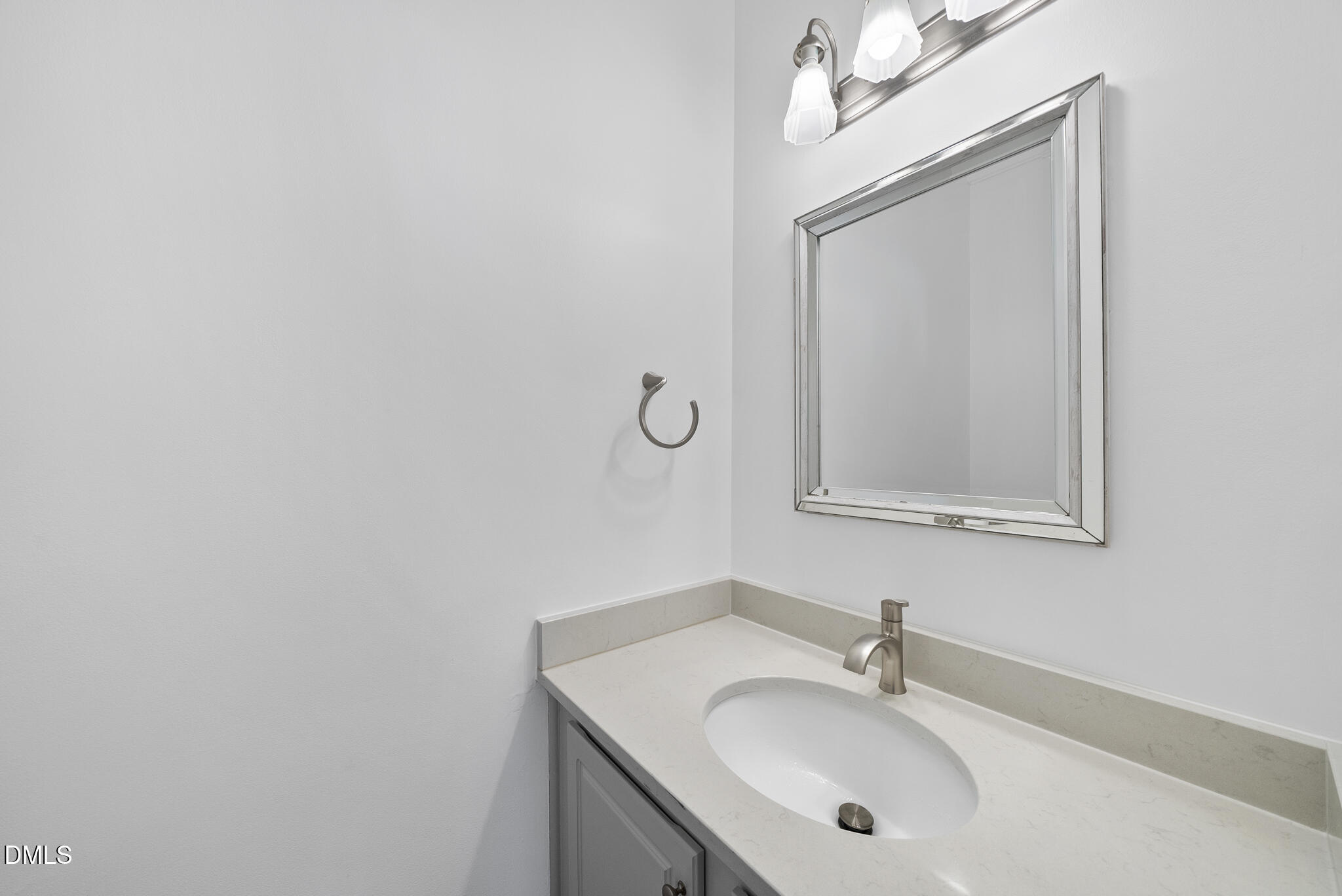 6 Cibola Court Durham, NC 27713 - Photo 19 of 30 a bathroom with a sink vanity and a mirror