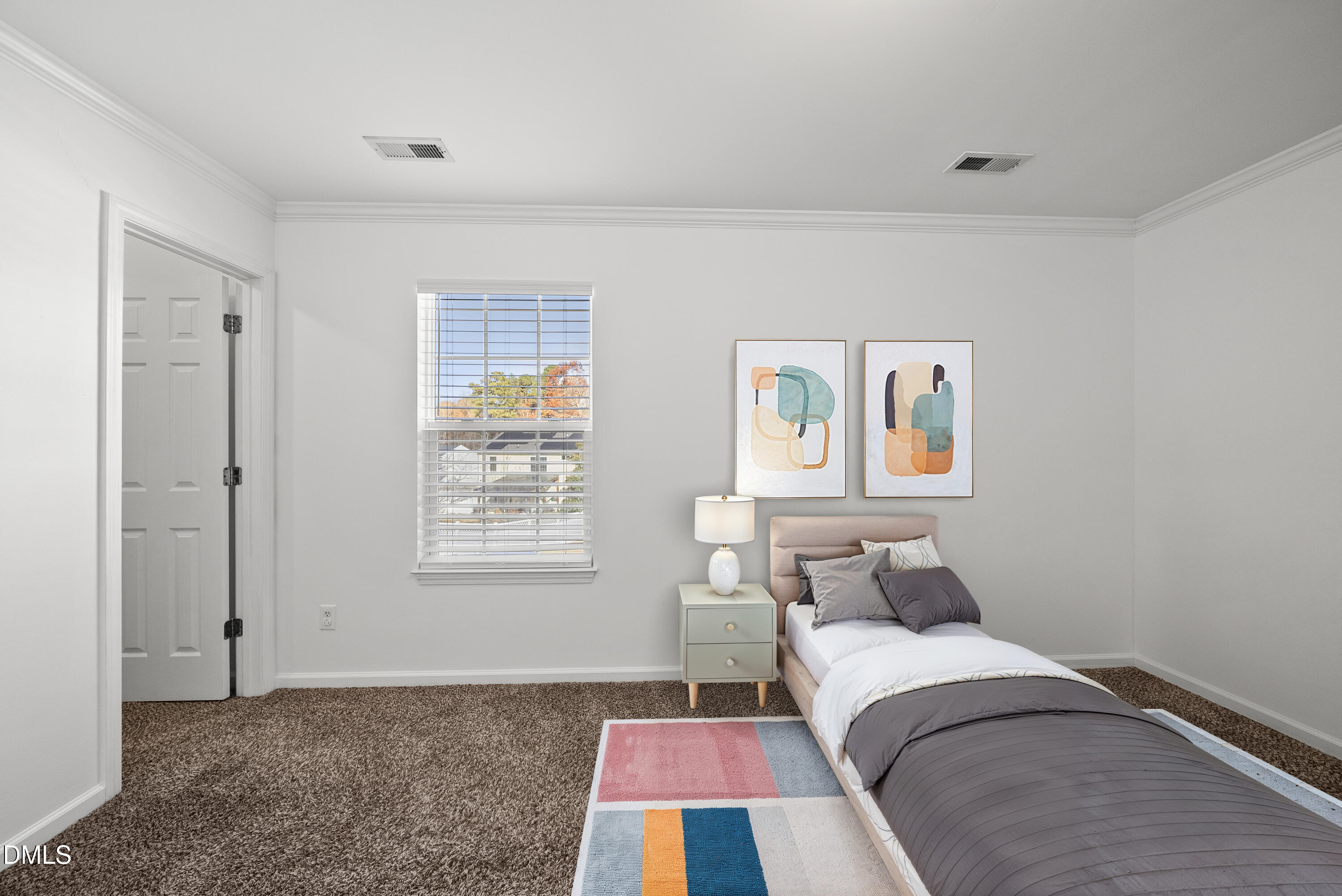 6 Cibola Court Durham, NC 27713 - Photo 21 of 30 a bedroom with a bed and a window