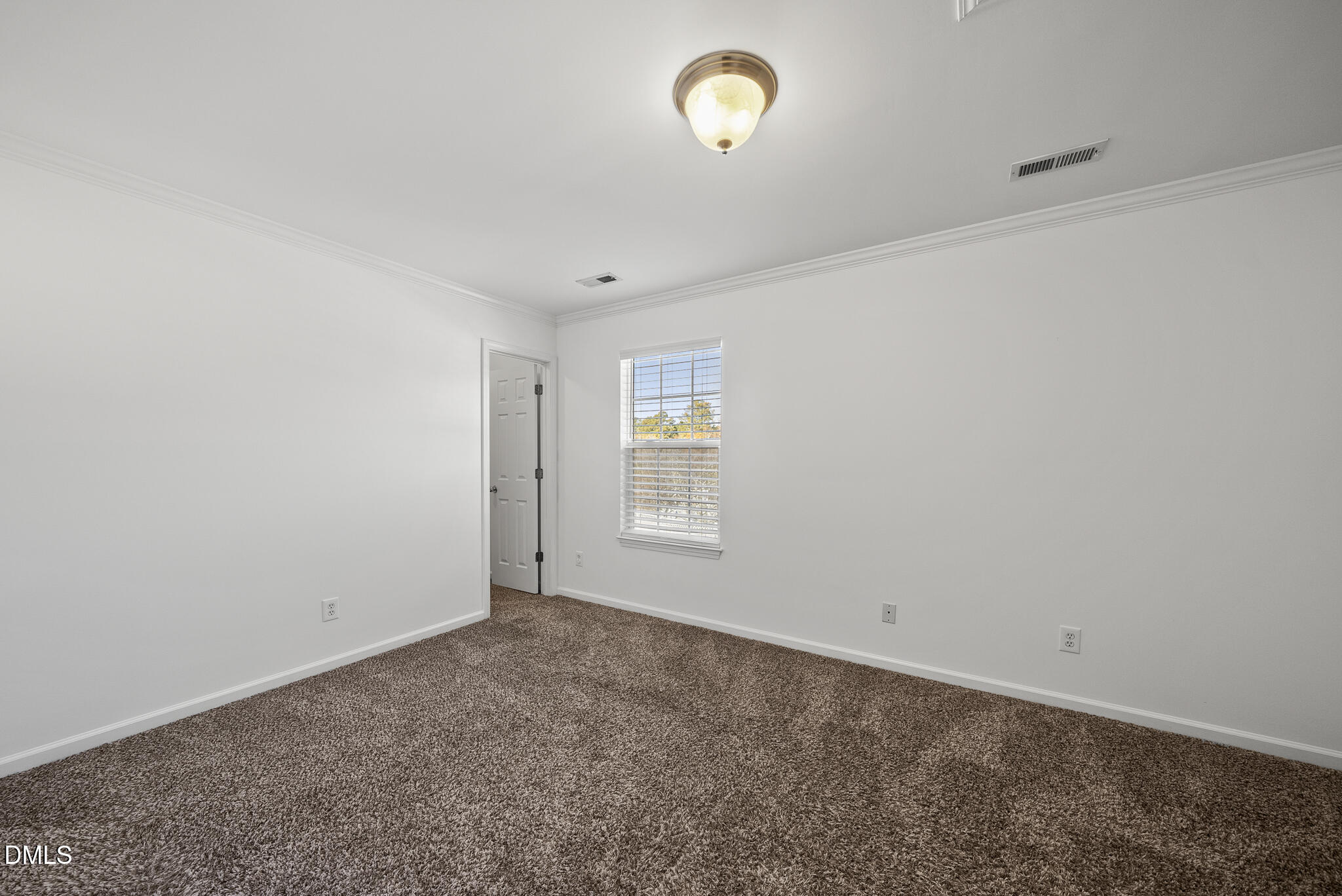 6 Cibola Court Durham, NC 27713 - Photo 22 of 30 an empty room with windows