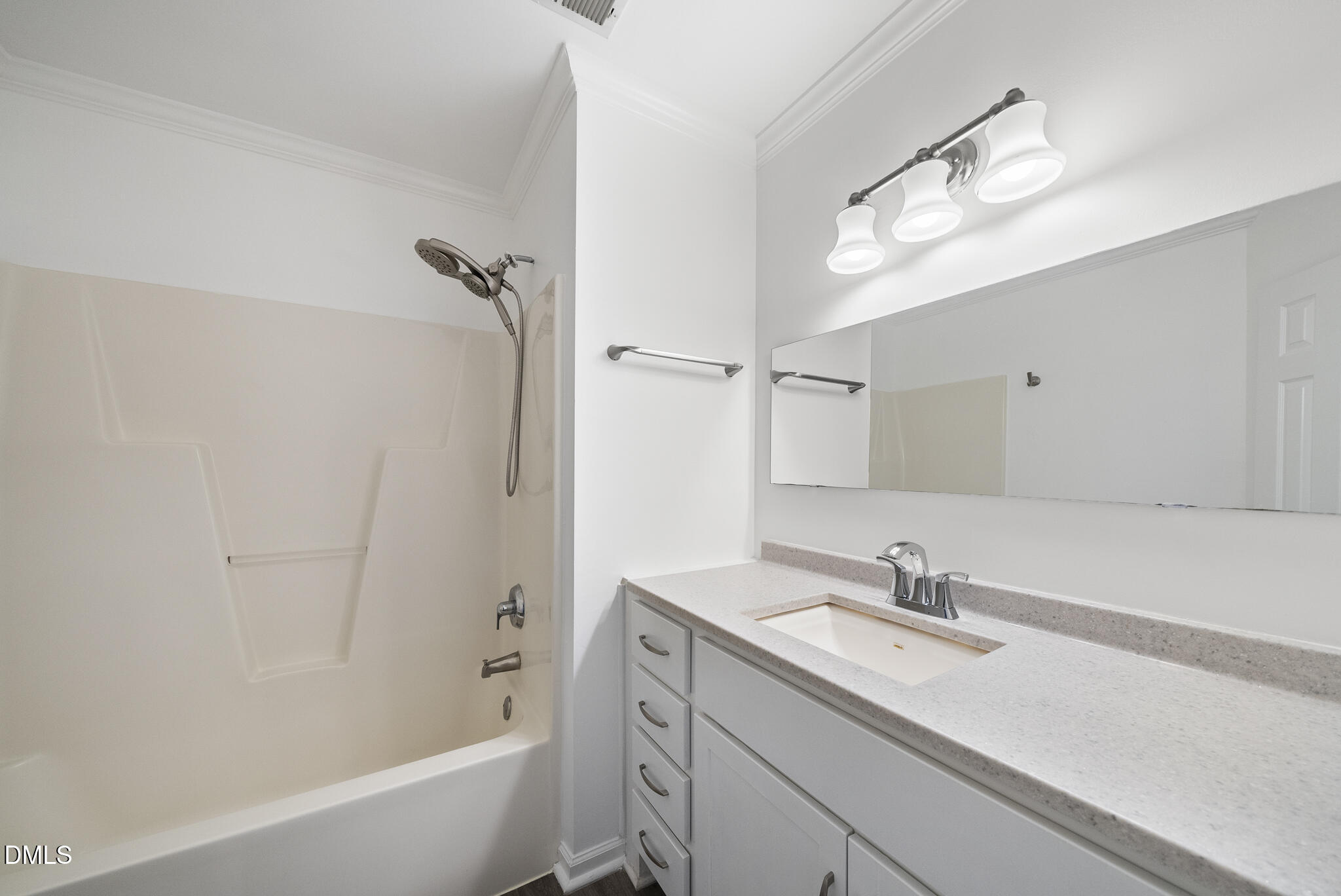 6 Cibola Court Durham, NC 27713 - Photo 23 of 30 a bathroom with a sink double vanity granite tub shower and mirror