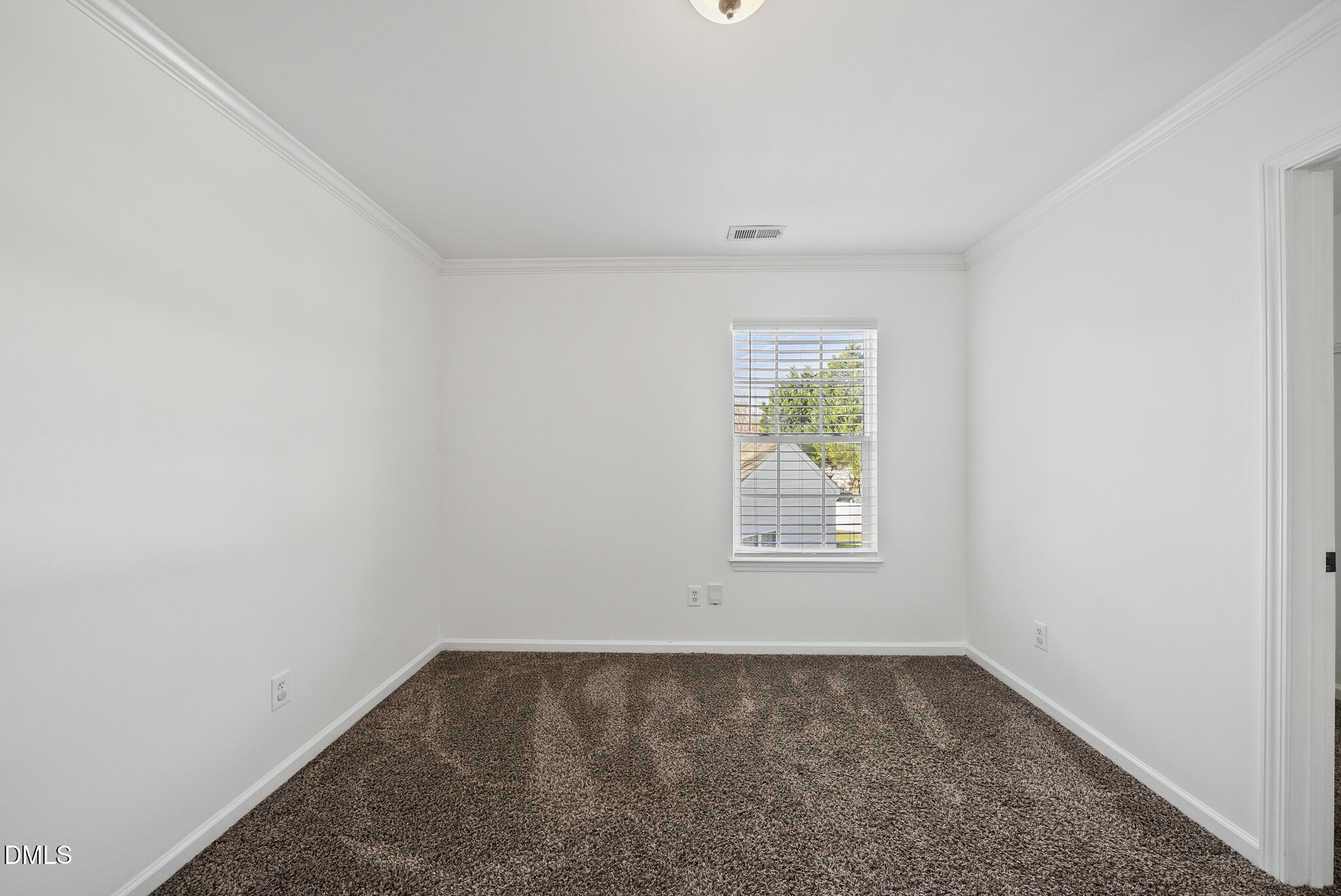 6 Cibola Court Durham, NC 27713 - Photo 25 of 30 an empty room with a window