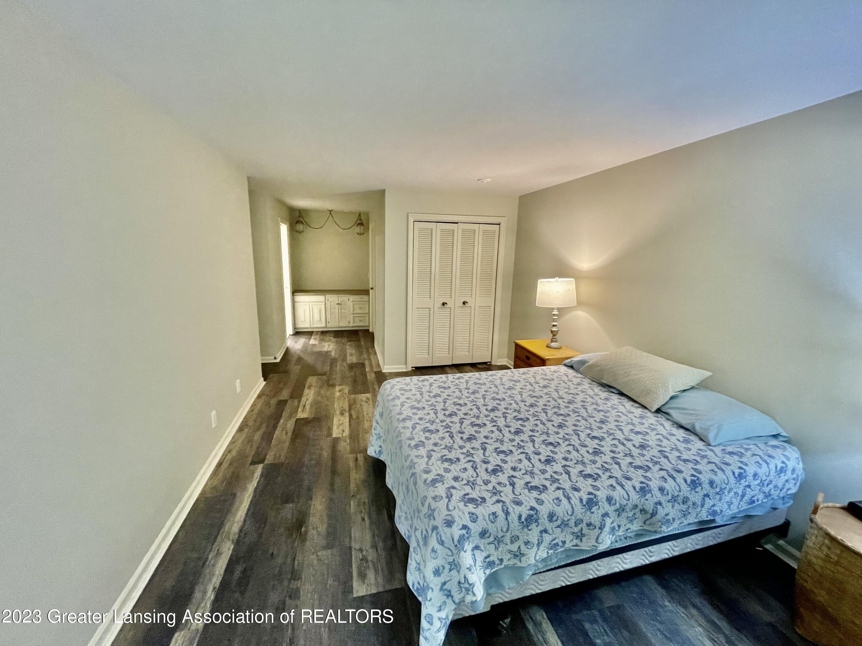 1740 Wellington Road, Unit 112 Lansing, MI 48910 - Photo 15 of 28 Master Bed