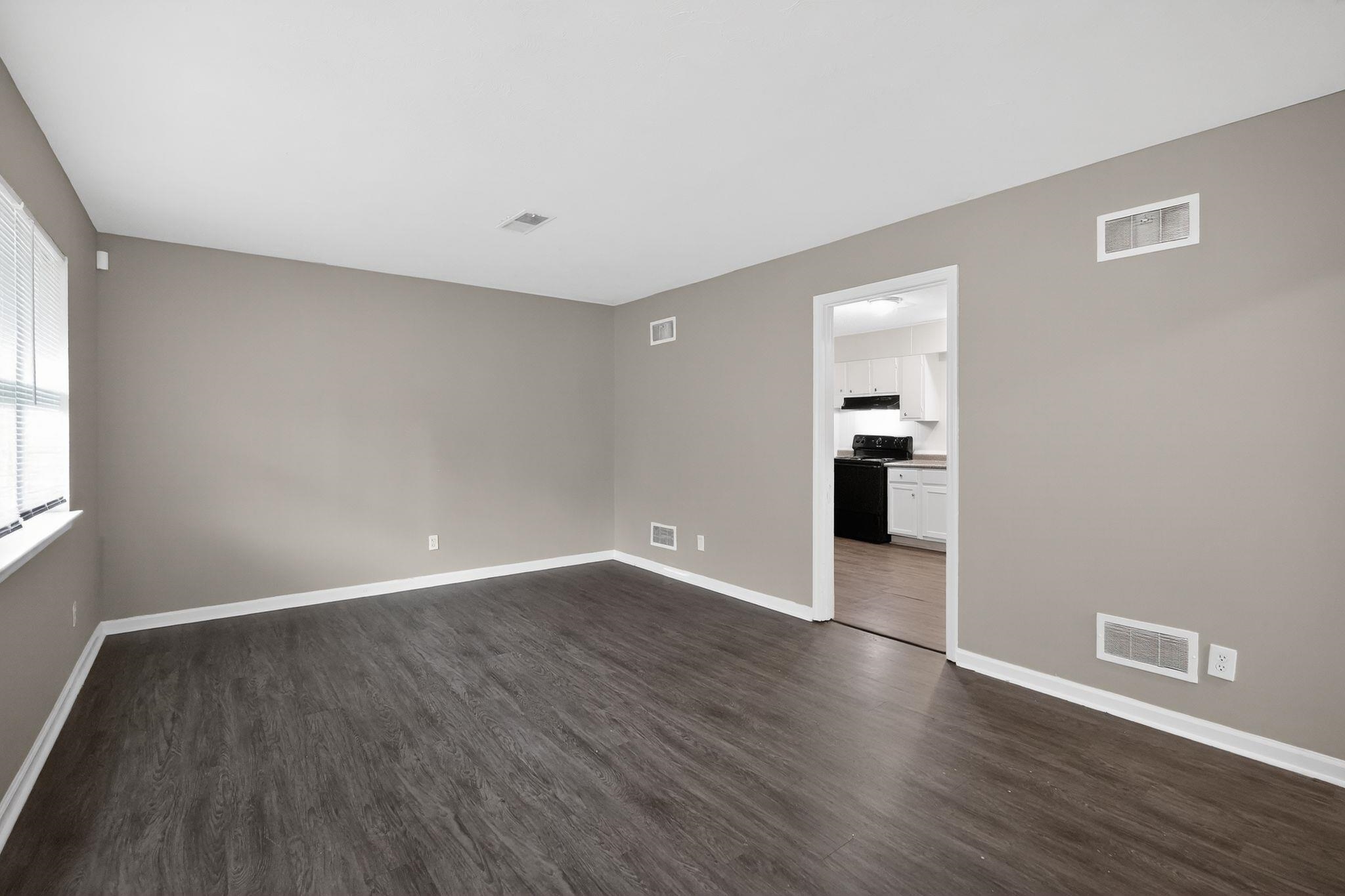 3603 England Street Memphis, TN 38127 - Photo 17 of 36 Spare room with dark wood finished floors and baseboards