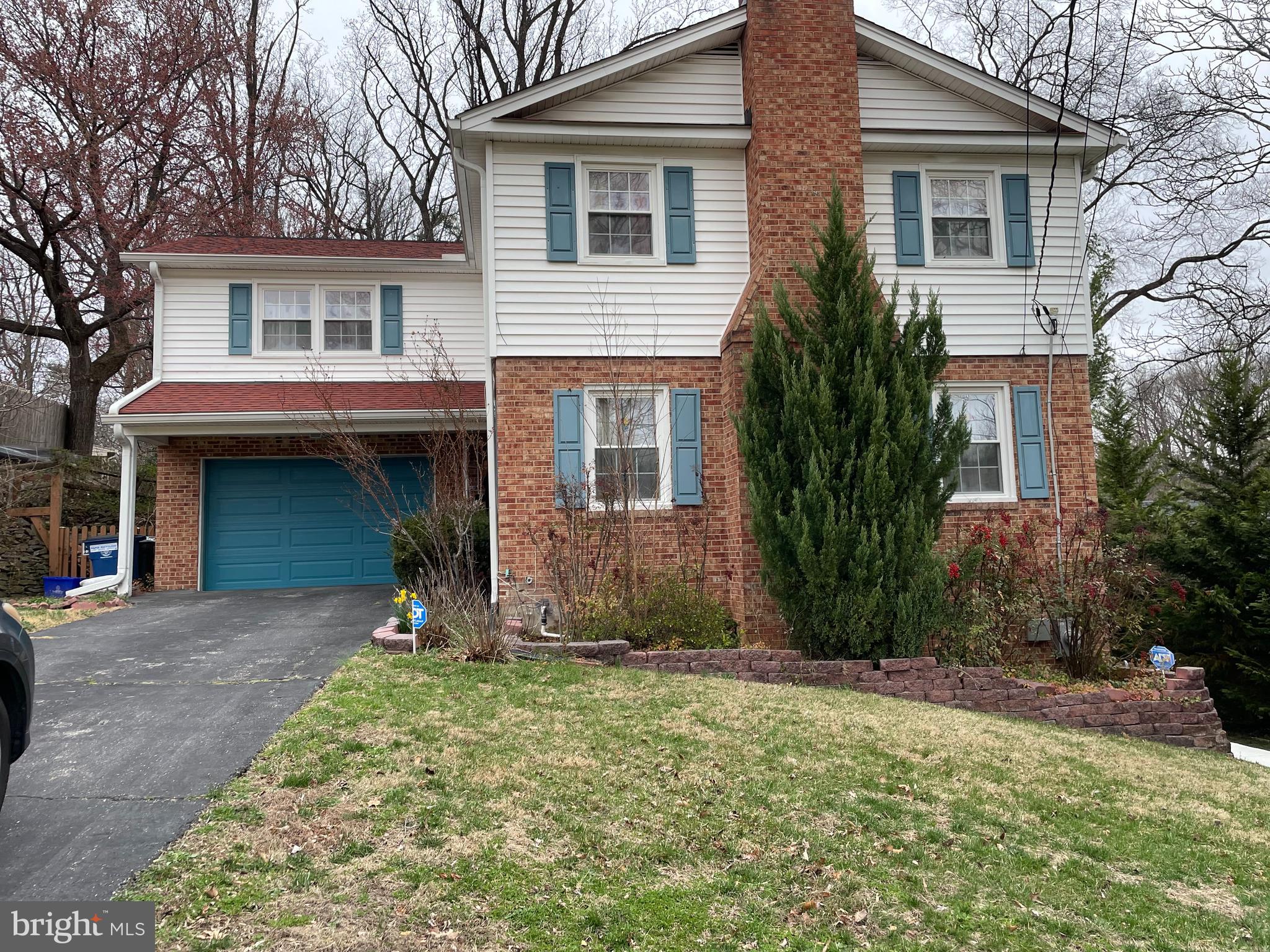 2016 Gatewood Place Silver Spring, MD 20903 - Photo 24 of 24 a front view of a house with garden