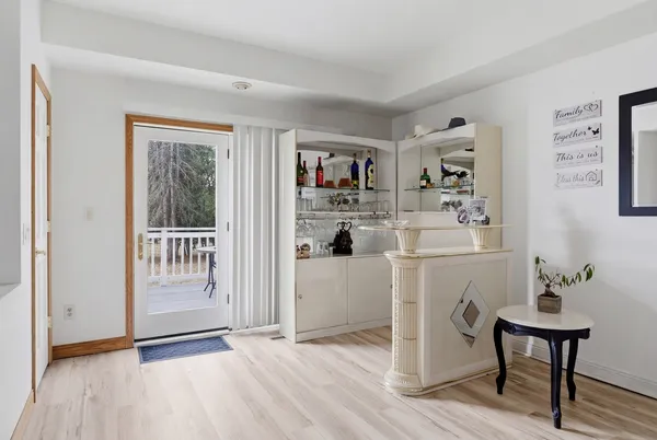 a workspace with furniture and window