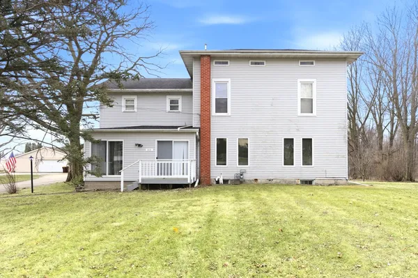 a front view of house with yard