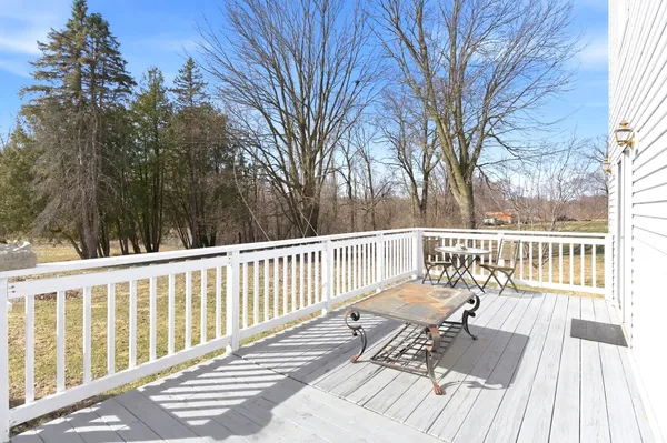 a view of a wooden roof deck