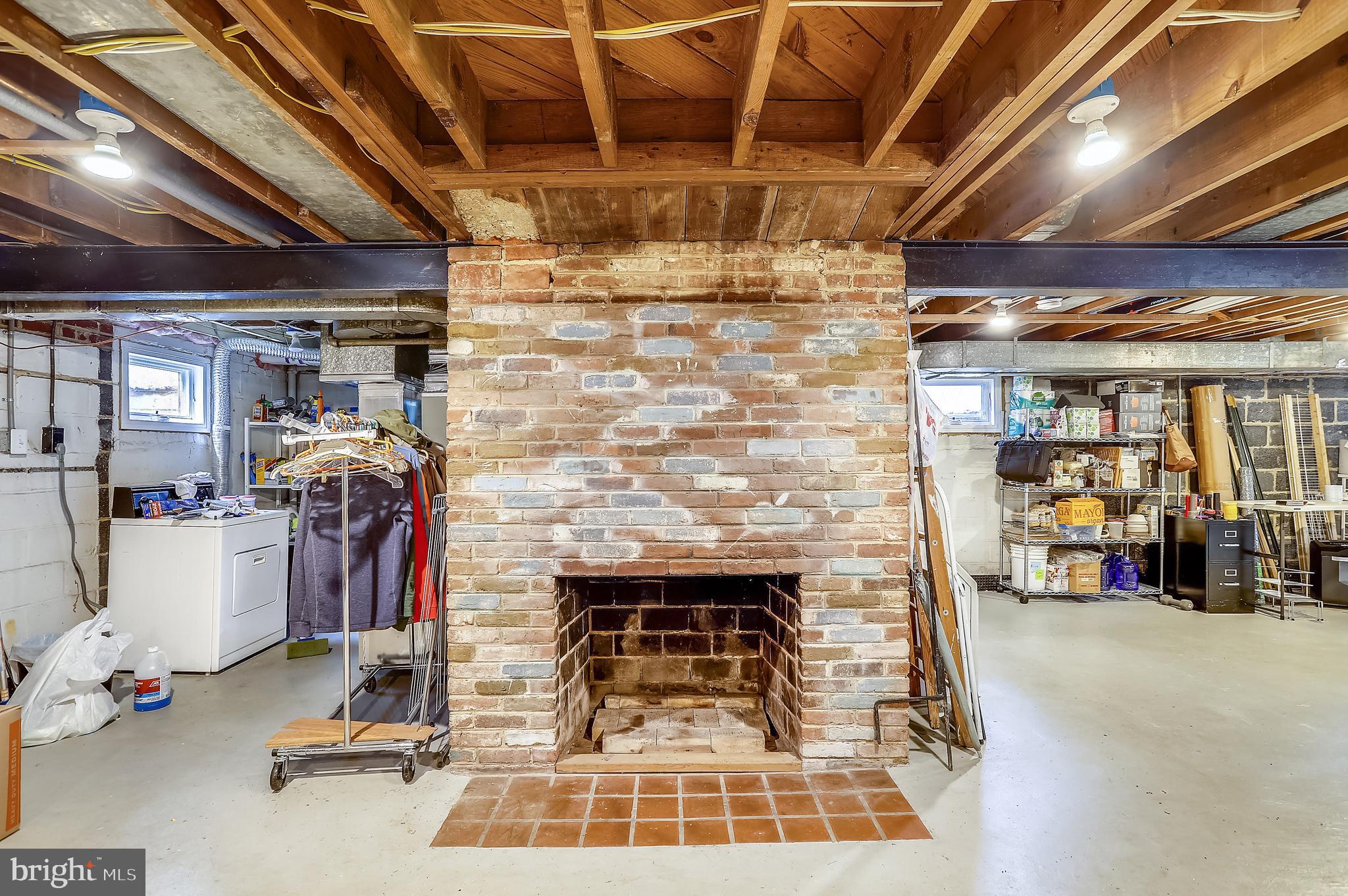 4522 Albion Road College Park, MD 20740 - Photo 28 of 76 Basement w/ fireplace & laundry area