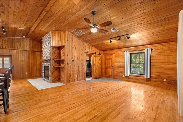 a view of entryway with wooden floor