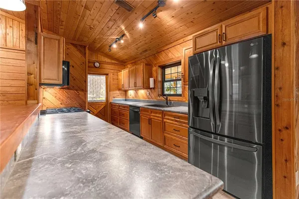 a view of a yard with a mountain