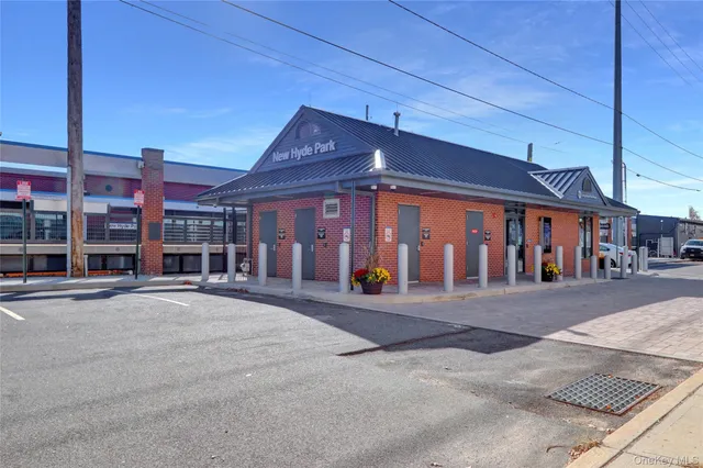 a front view of building with street view