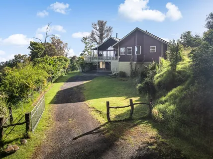 a house view with a garden space