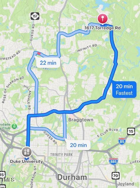 1617 Torredge Road Durham, NC 27712 - Photo 8 of 8 a sign that is on a street