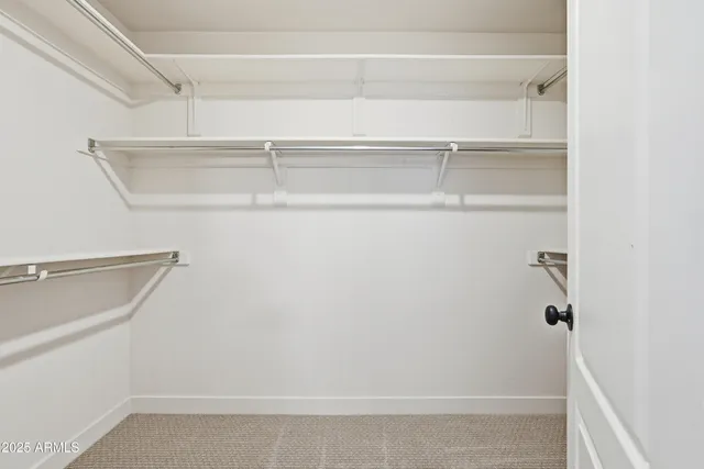 a view of a room with racks on the wall