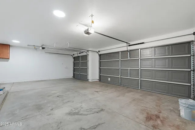 a view of an empty room with empty shelves