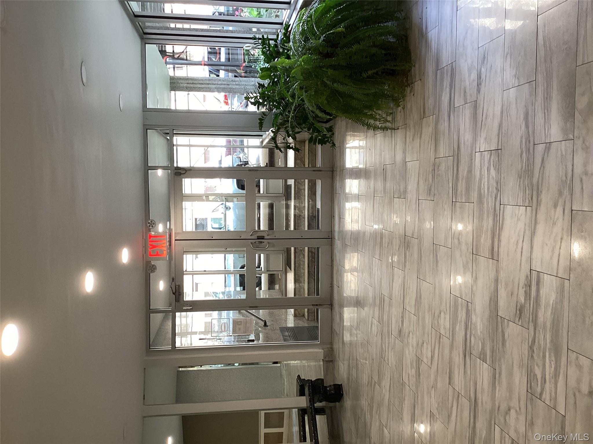 3176 Decatur Avenue, Unit 4F Bronx, NY 10467 - Photo 12 of 13 a living room with furniture