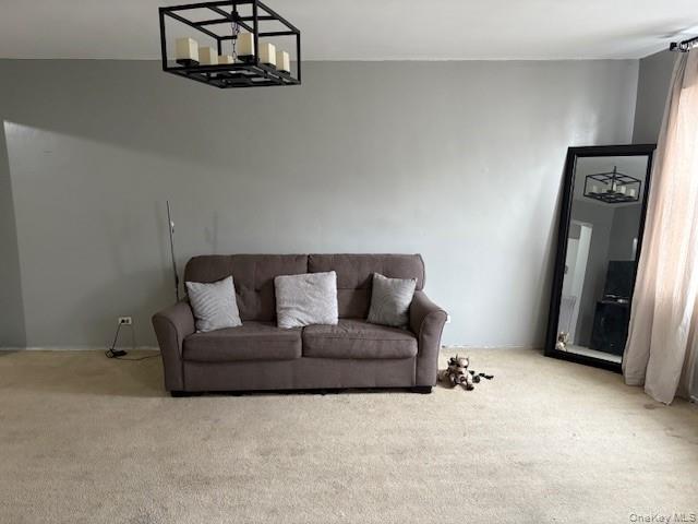 3176 Decatur Avenue, Unit 4F Bronx, NY 10467 - Photo 13 of 23 a living room with furniture and a flat screen tv