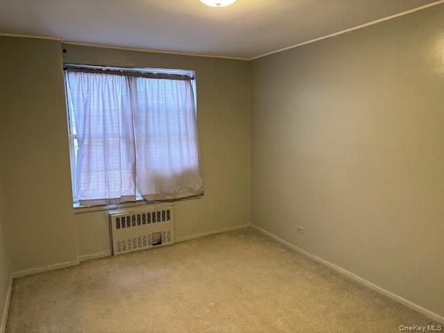 3176 Decatur Avenue, Unit 4F Bronx, NY 10467 - Photo 20 of 23 an empty room with a window