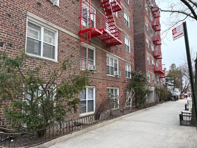 3176 Decatur Avenue, Unit 4F Bronx, NY 10467 - Photo 22 of 23 a front view of a house with parking