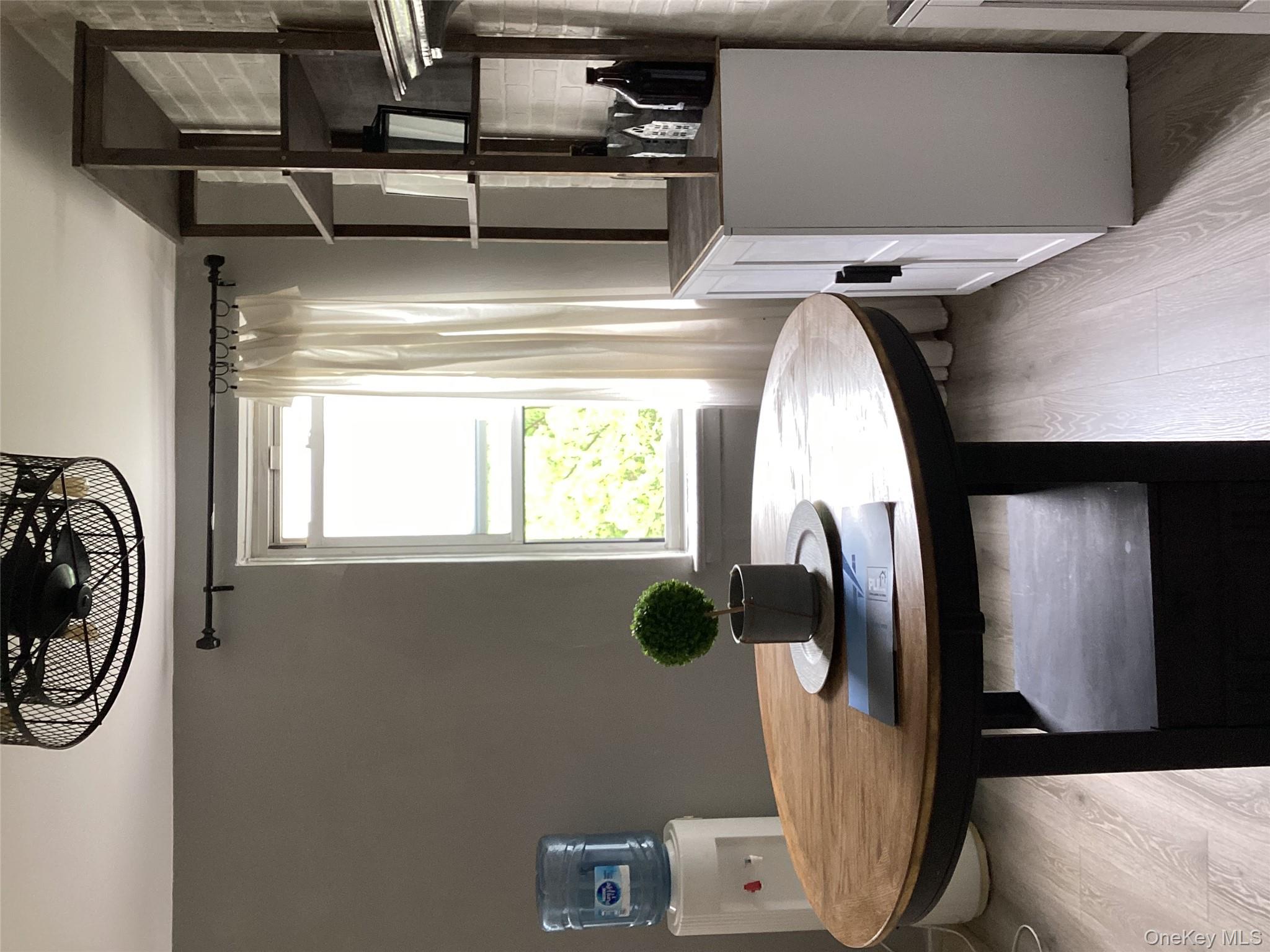 3176 Decatur Avenue, Unit 4F Bronx, NY 10467 - Photo 6 of 13 a dining room with a table and chairs