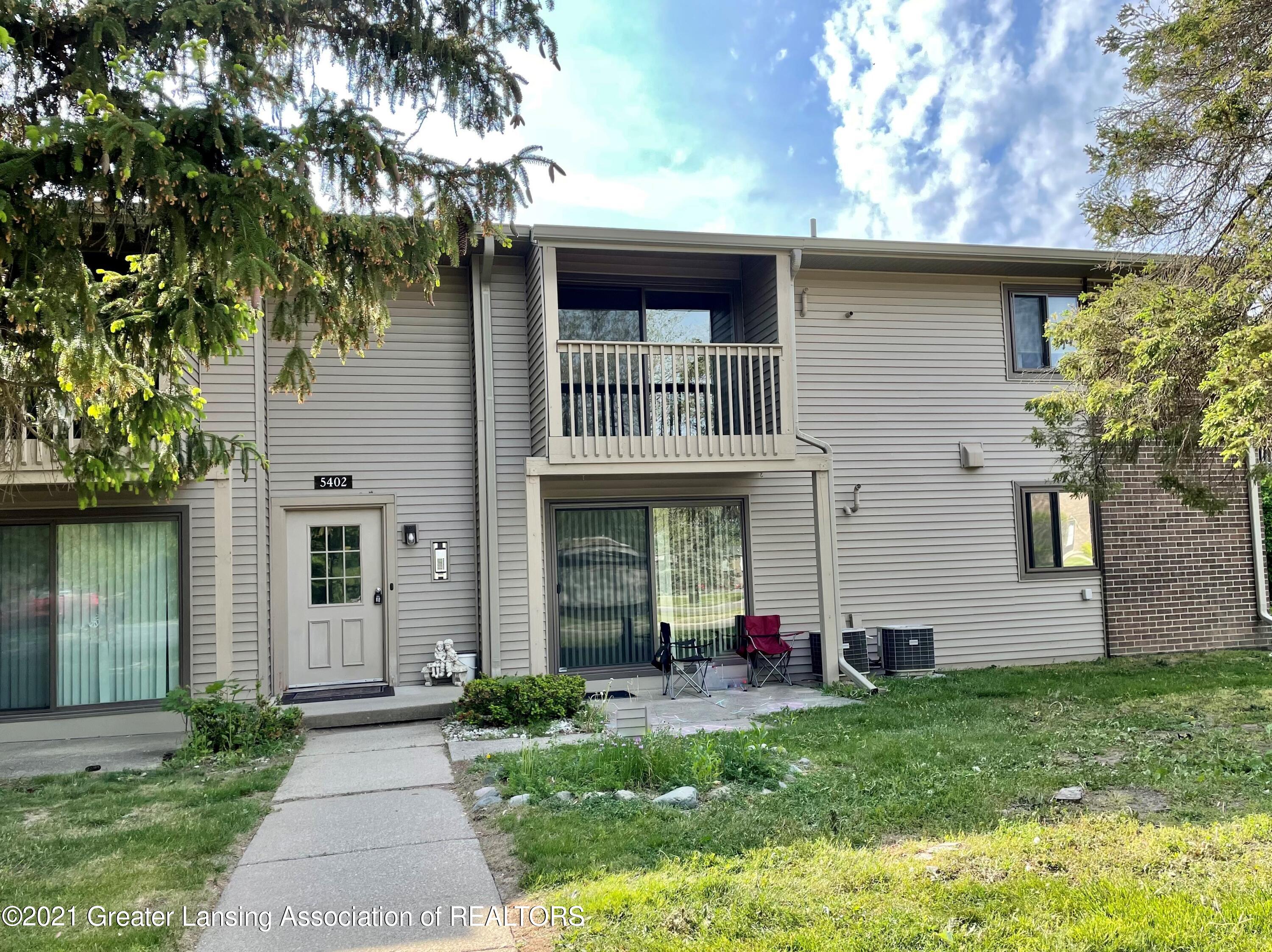 5402 Maple Ridge Road, Unit 6 Haslett, MI 48840 - Photo 1 of 21 Front