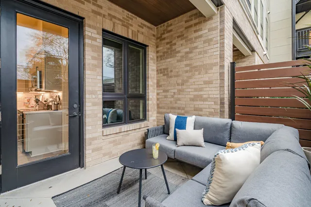 a building outdoor space with patio furniture