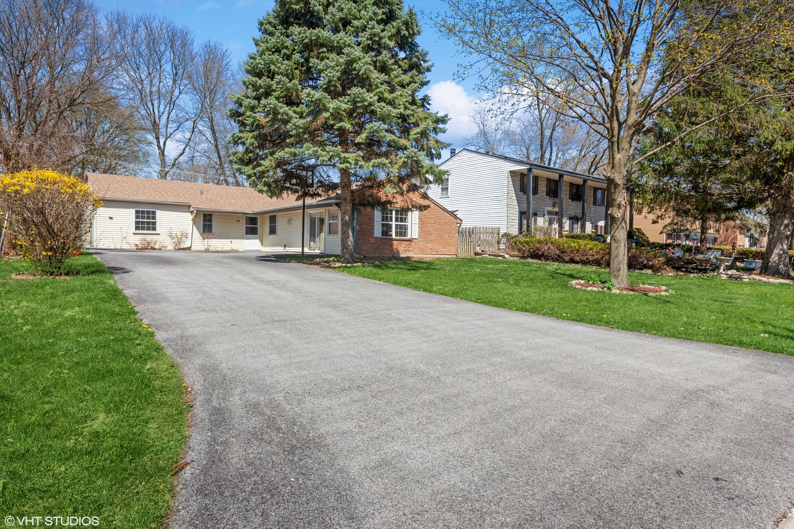 269 Seabury Road Bolingbrook, IL 60440 - Photo 1 of 21 a front view of a house with a garden and trees