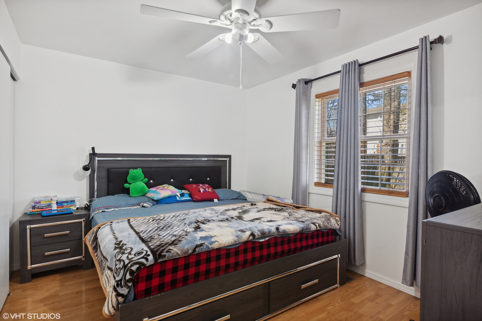 269 Seabury Road Bolingbrook, IL 60440 - Photo 11 of 21 a bedroom with a bed and a chandelier