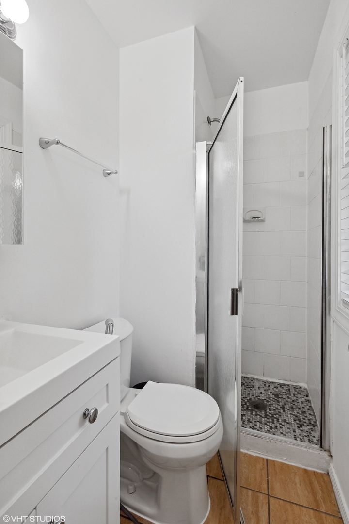 269 Seabury Road Bolingbrook, IL 60440 - Photo 15 of 21 a bathroom with a sink a toilet and shower