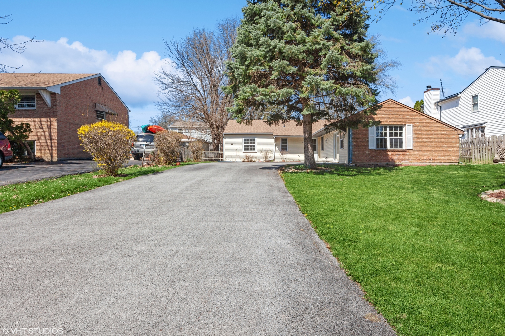 269 Seabury Road Bolingbrook, IL 60440 - Photo 3 of 21 a front view of a house with a yard and garage