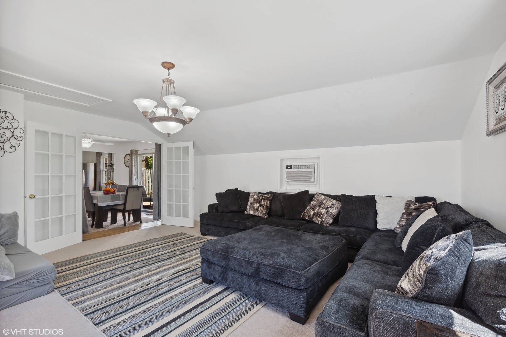 269 Seabury Road Bolingbrook, IL 60440 - Photo 5 of 21 a living room with furniture and a dining table with wooden floor