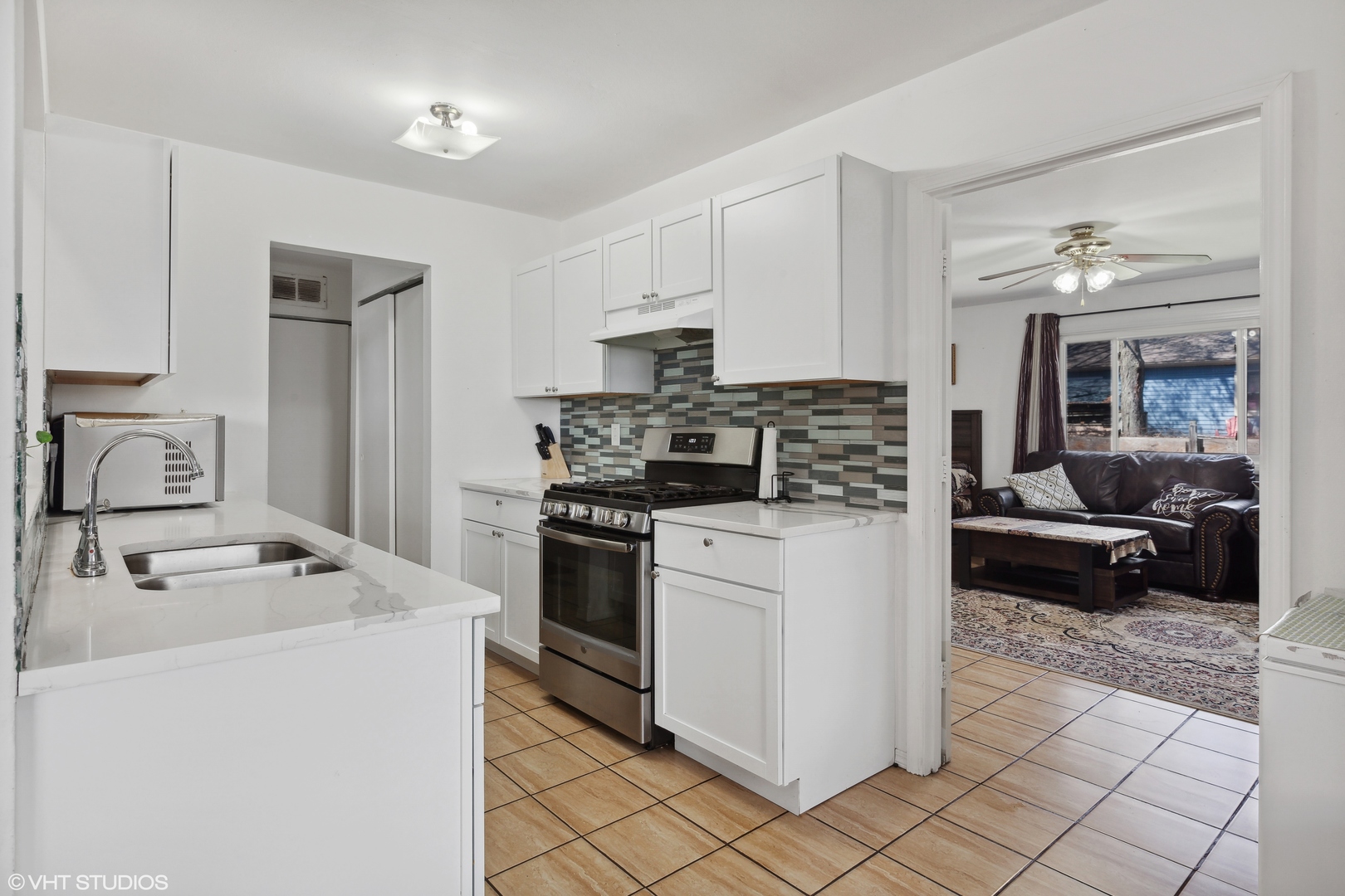 269 Seabury Road Bolingbrook, IL 60440 - Photo 9 of 21 a kitchen with refrigerator stove and sink