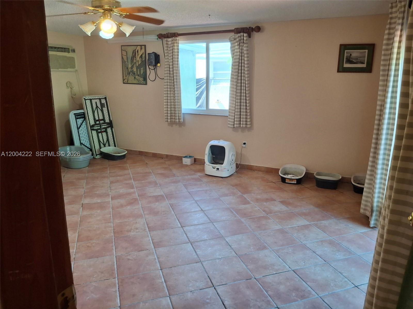 540 Southwest 39th Avenue Miami, FL 33134 - Photo 13 of 48 a view of a livingroom with furniture and a window
