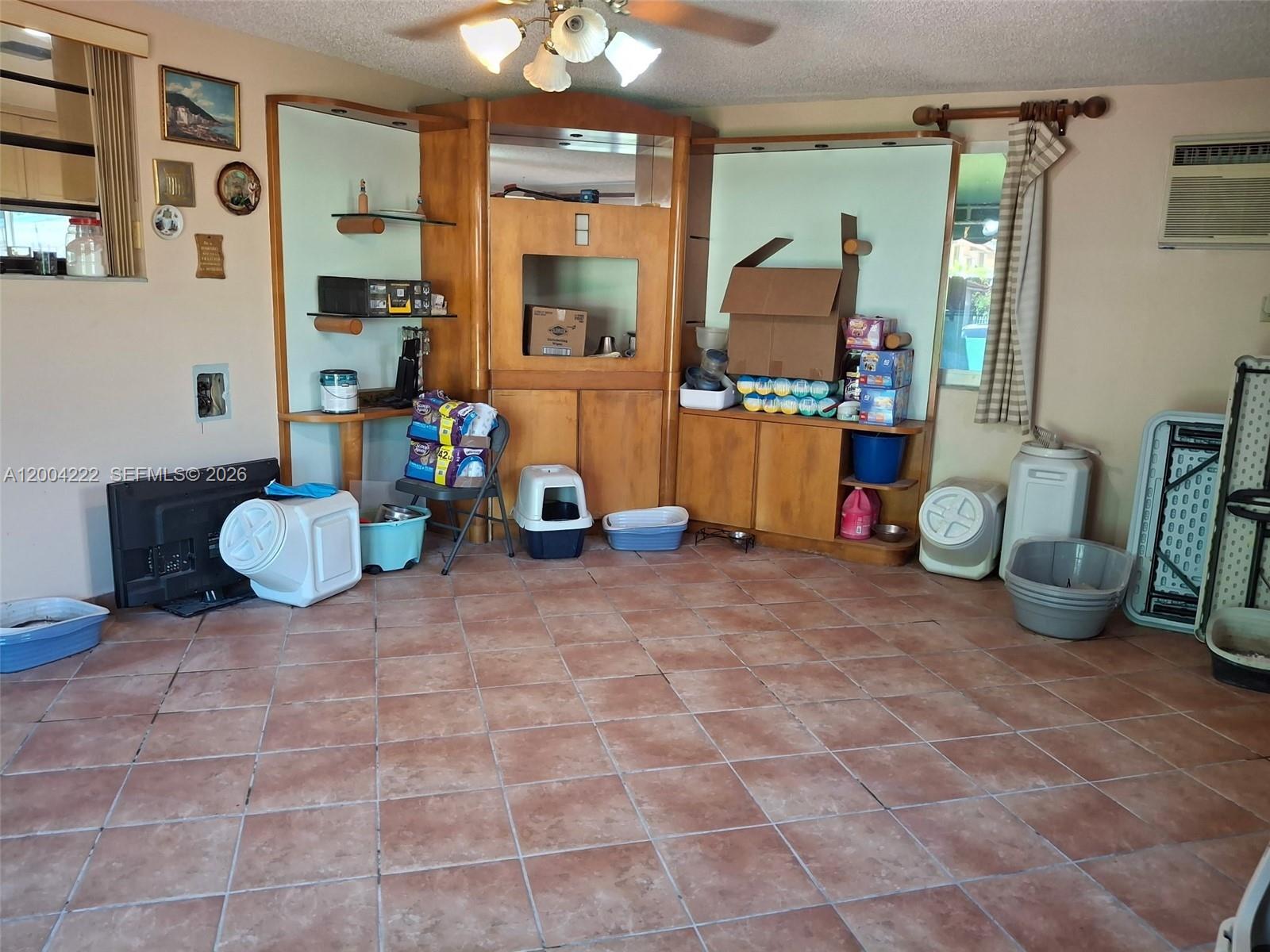 540 Southwest 39th Avenue Miami, FL 33134 - Photo 14 of 48 a living room with furniture and a flat screen tv
