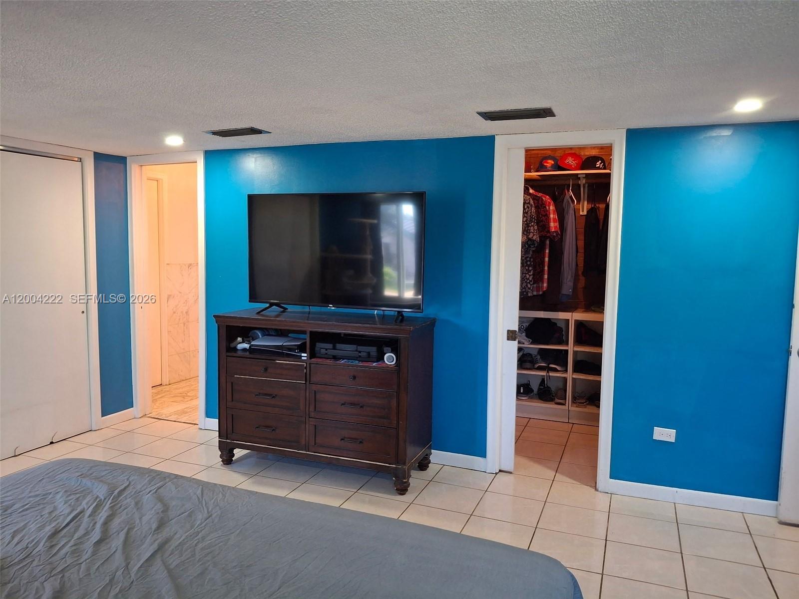 540 Southwest 39th Avenue Miami, FL 33134 - Photo 20 of 48 a living room with furniture and a flat screen tv