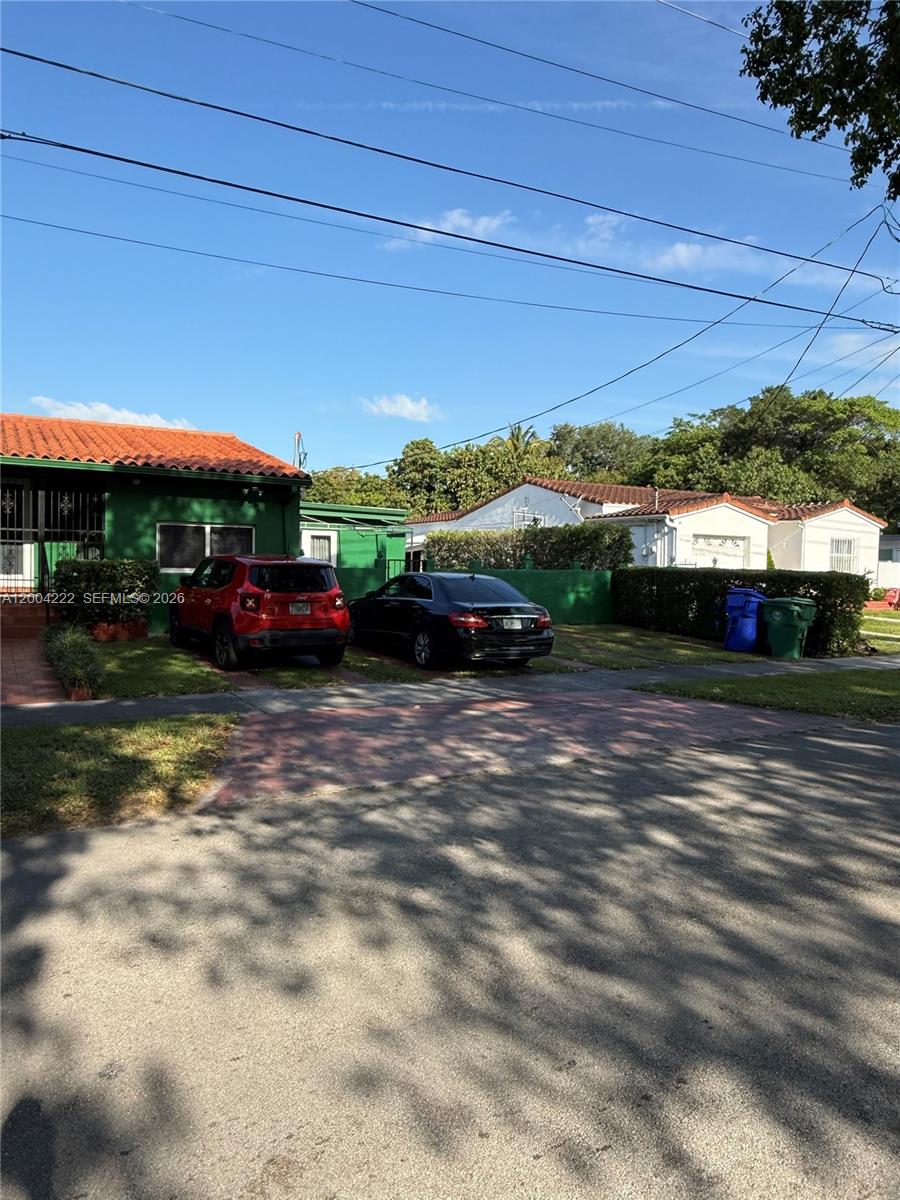 540 Southwest 39th Avenue Miami, FL 33134 - Photo 2 of 48 a view of yard with car parked