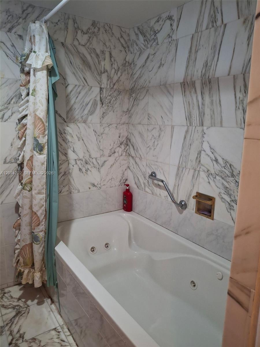540 Southwest 39th Avenue Miami, FL 33134 - Photo 23 of 48 a bathroom with a bathtub