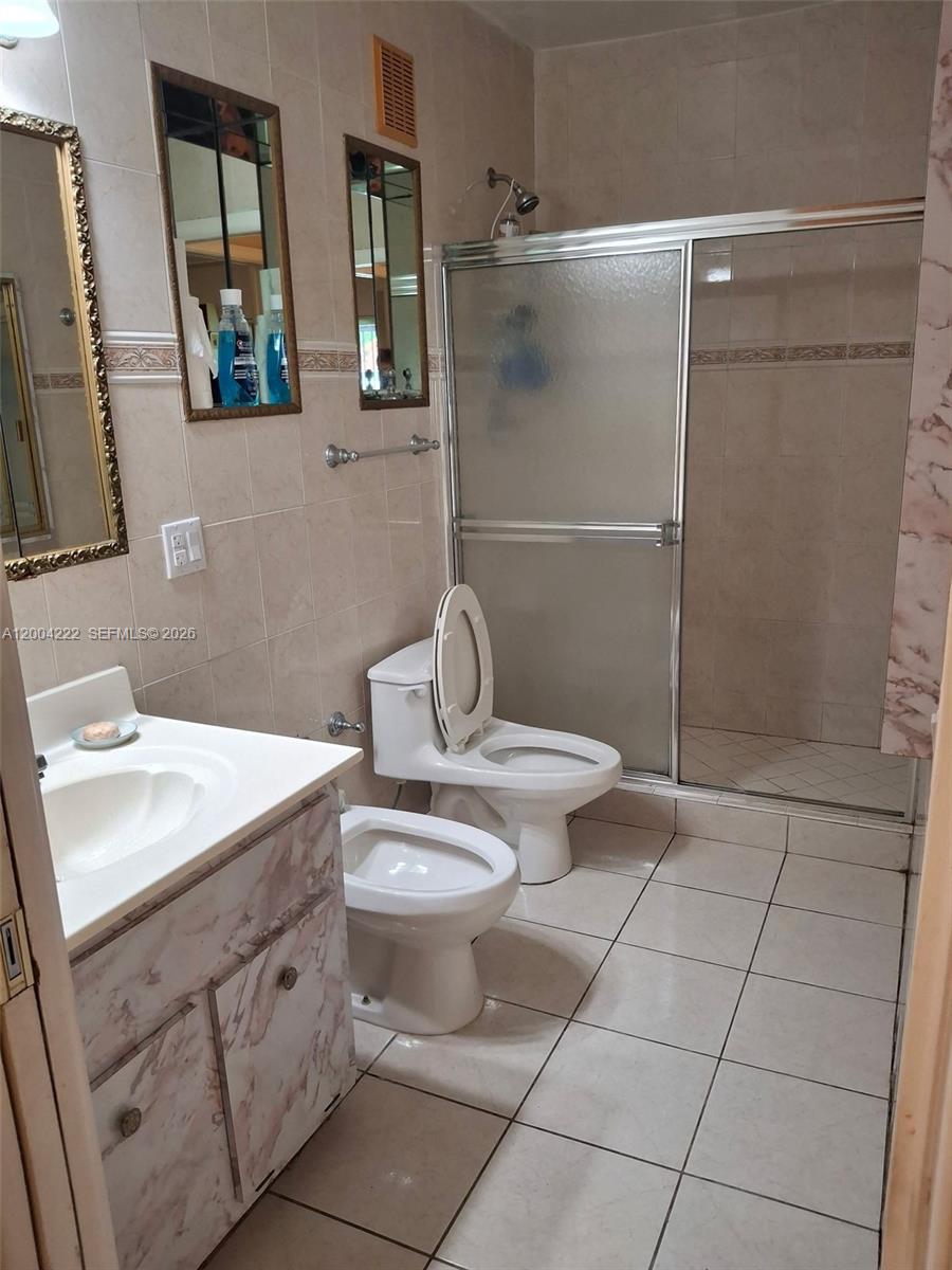 540 Southwest 39th Avenue Miami, FL 33134 - Photo 28 of 48 a bathroom with a sink toilet and shower