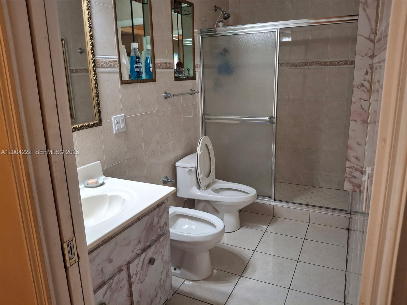 540 Southwest 39th Avenue Miami, FL 33134 - Photo 30 of 48 a bathroom with a toilet sink and shower