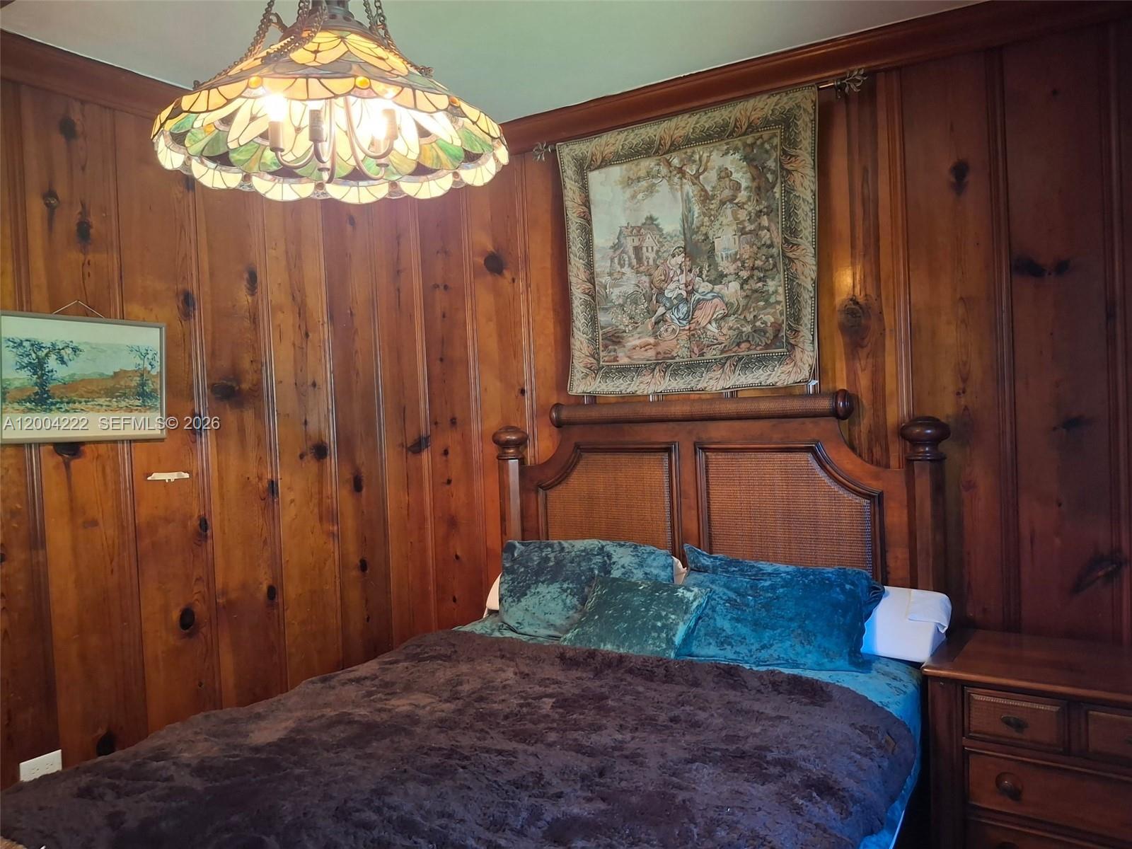 540 Southwest 39th Avenue Miami, FL 33134 - Photo 33 of 48 a bedroom with a bed and a window
