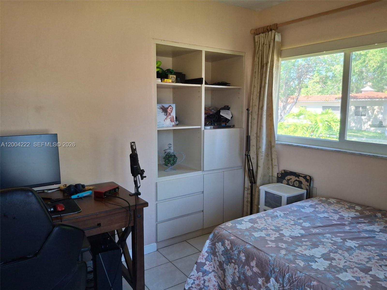 540 Southwest 39th Avenue Miami, FL 33134 - Photo 36 of 48 a bedroom with a bed and a window