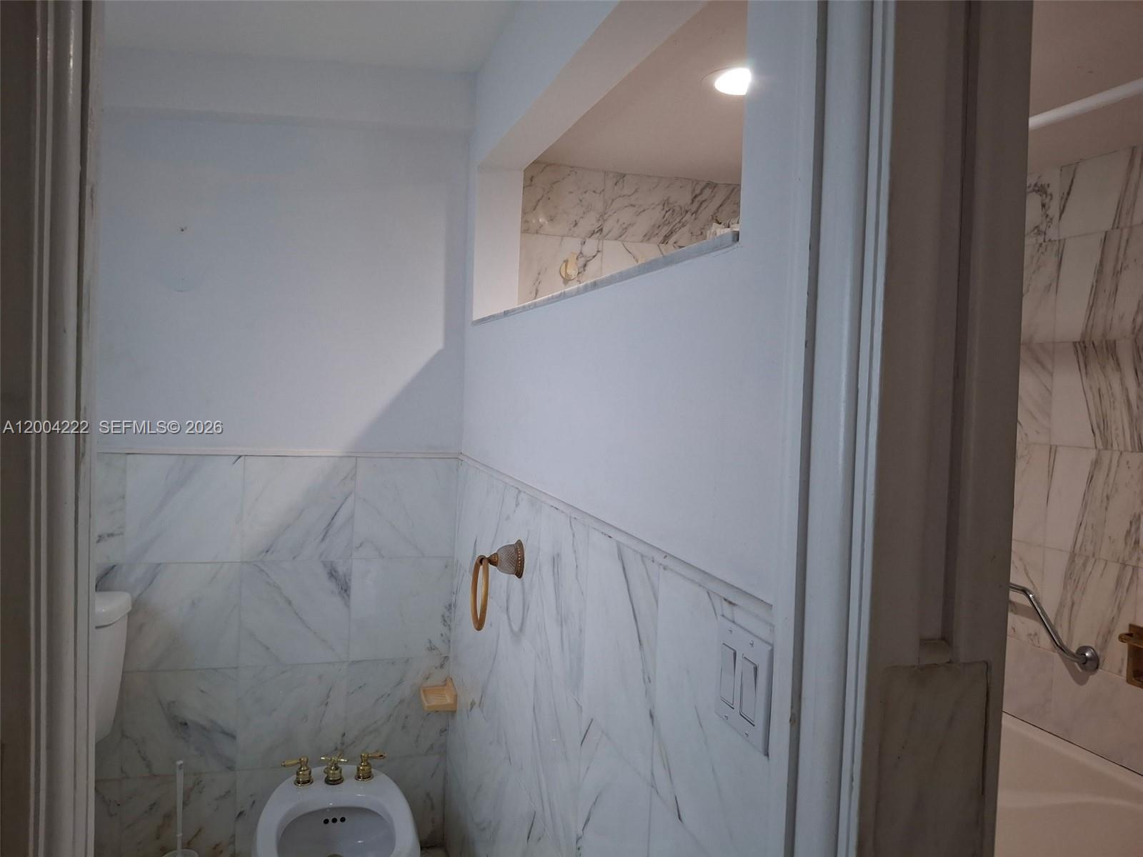 540 Southwest 39th Avenue Miami, FL 33134 - Photo 37 of 48 a bathroom with a shower and toilet