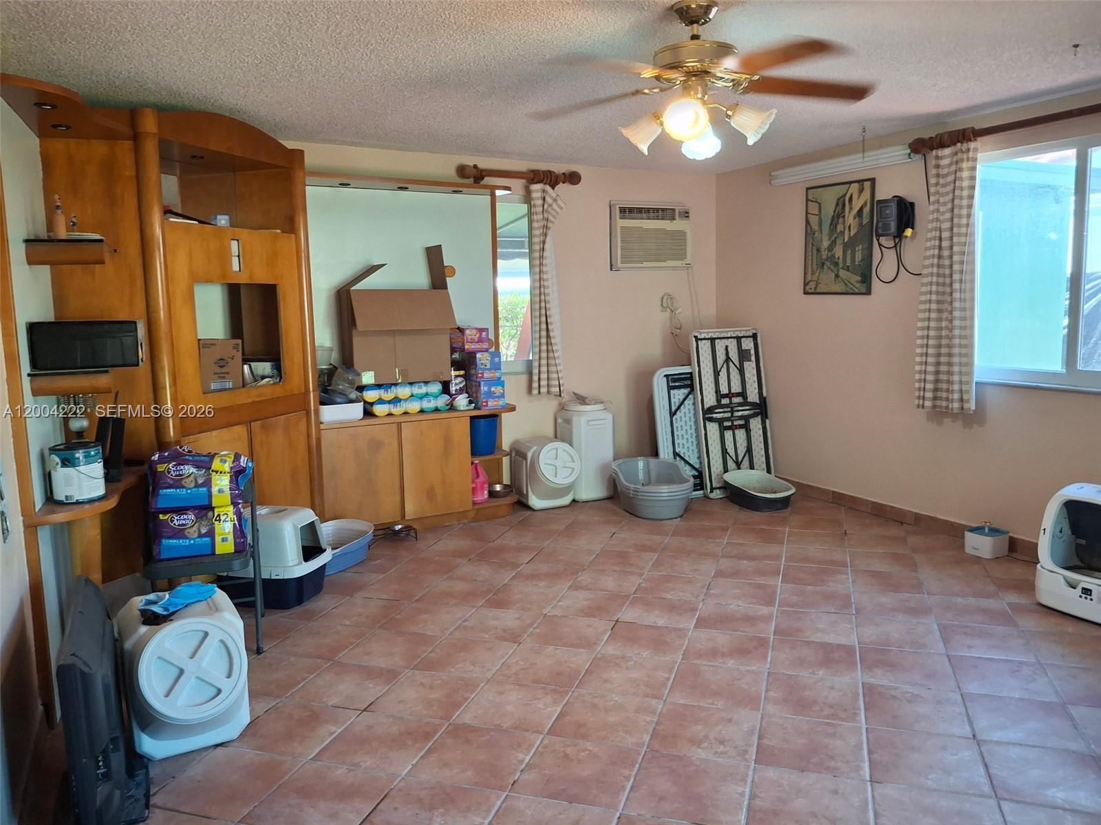 540 Southwest 39th Avenue Miami, FL 33134 - Photo 42 of 48 a view of a workspace with furniture and a window