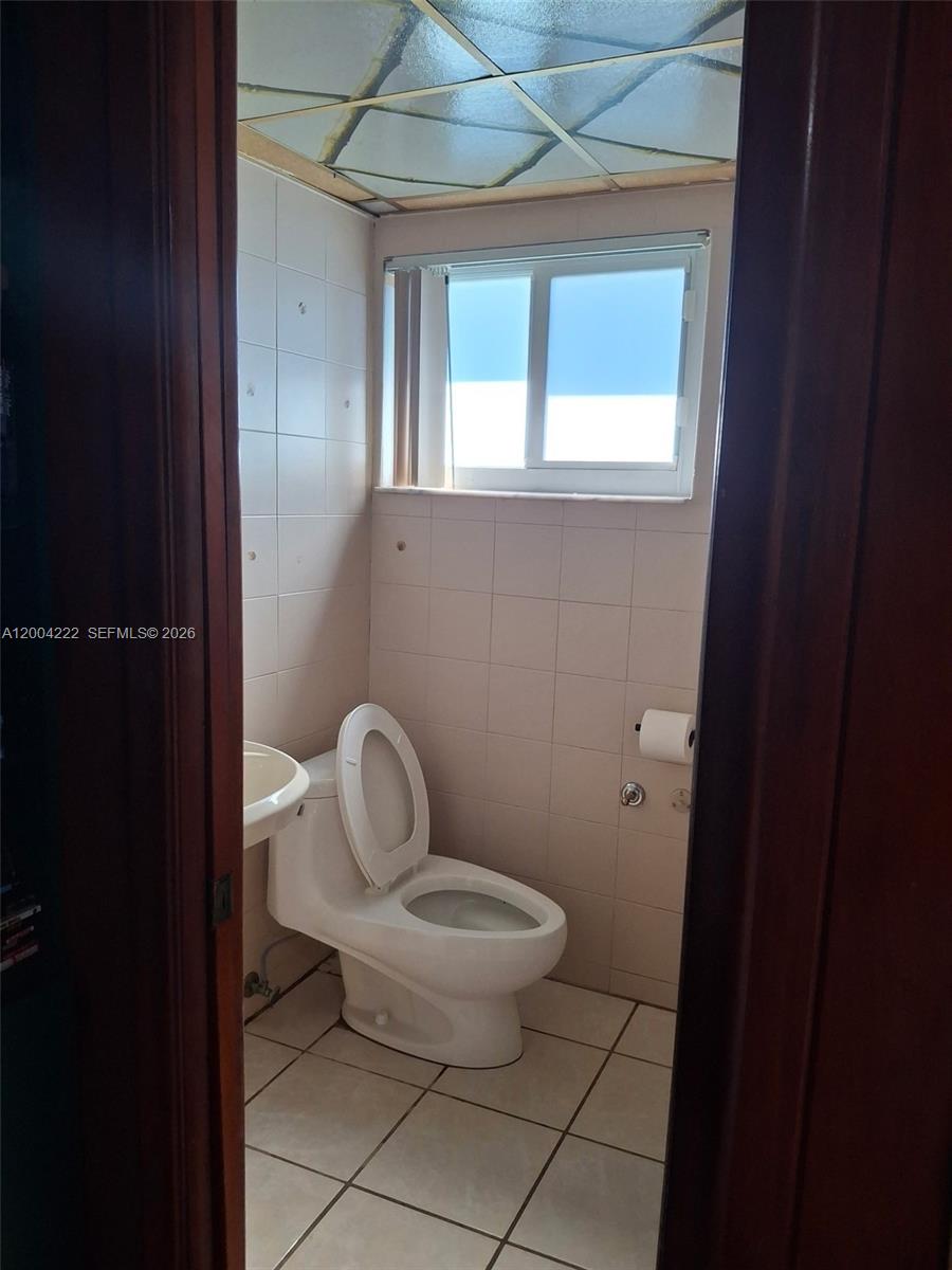 540 Southwest 39th Avenue Miami, FL 33134 - Photo 45 of 48 a bathroom with a toilet
