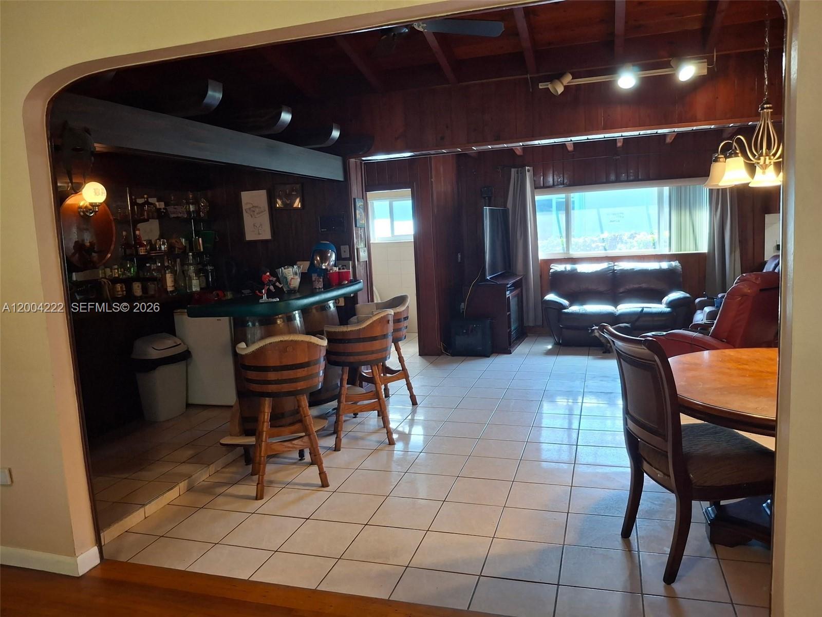 540 Southwest 39th Avenue Miami, FL 33134 - Photo 6 of 48 a living room with furniture a lamp and a potted plant