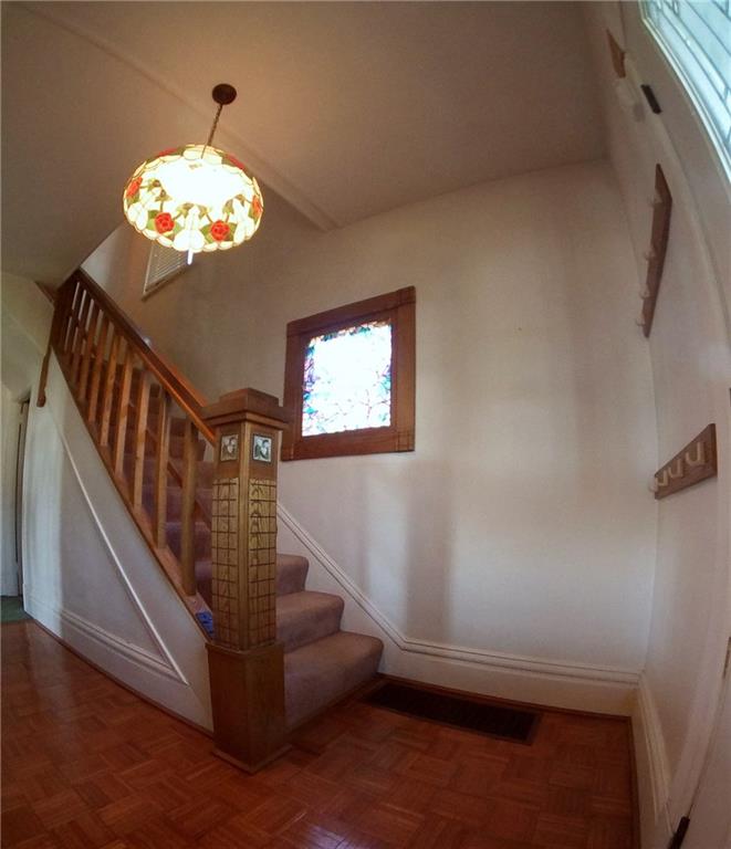 5365 Library Road Bethel Park, PA 15102 - Photo 2 of 25 Beautiful oak woodwork, stained glass window and chandelier welcome guests.
