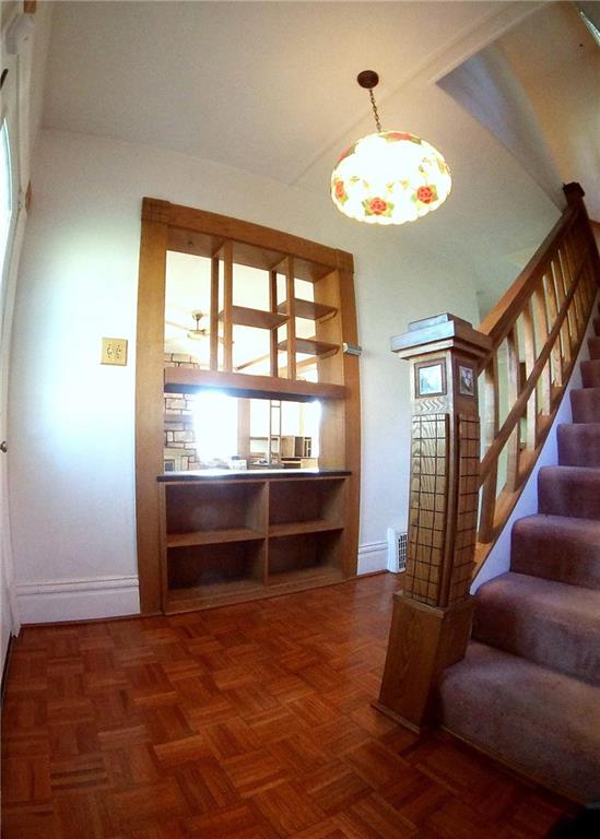 5365 Library Road Bethel Park, PA 15102 - Photo 3 of 25 Carved banister trim, open shelving and gleaming floors in the 17x7 entry.