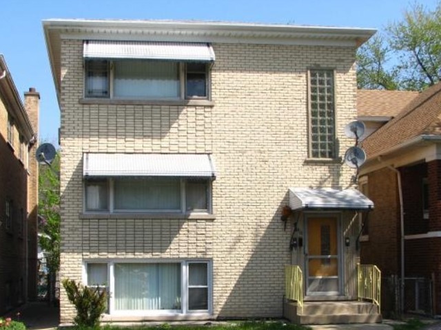 5740 West Addison Street Chicago, IL 60634 - Photo 1 of 1 a view of house with outdoor space