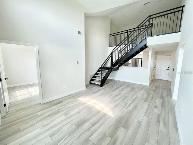 a view of entryway with wooden floor